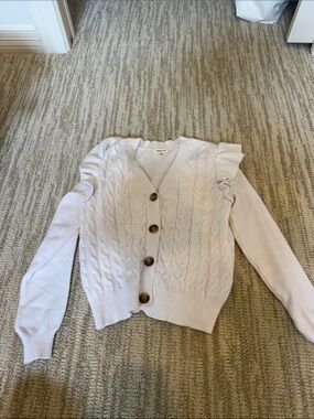 Sugar Cream Cable-Knit Ruffle Shoulder Cardigan